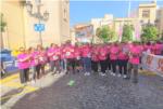 Els carrers de Sueca i voltants somplin de color rosa amb la Run Cncer 2022