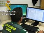 La Guardia Civil detiene a un trabajador por delito de estafa en una corredura de seguros de Carcaixent