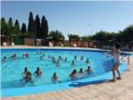 Un centenar d'escolars d'Almussafes gaudixen d'una jornada ldica en la piscina municipal
