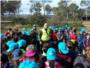 Els escolars de Guadassuar commemoren el Dia del Arbre amb una visita a la Garrofera