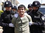 China exhibe en televisión a cuatro condenados a muerte