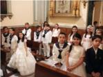 Los nios de la Parroquia de Santa Catalina de Alzira celebran su Primera Comunin