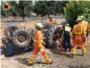 Un home ha quedat atrapat baix el seu tractor a un camp d'Alzira